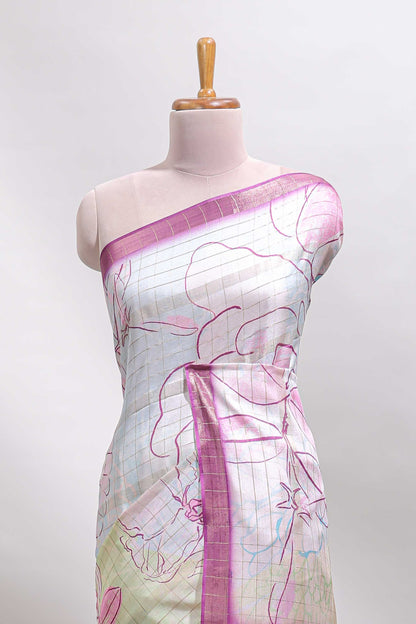 Multi color checked floral design tussar saree with contrast border and zari striped blouse