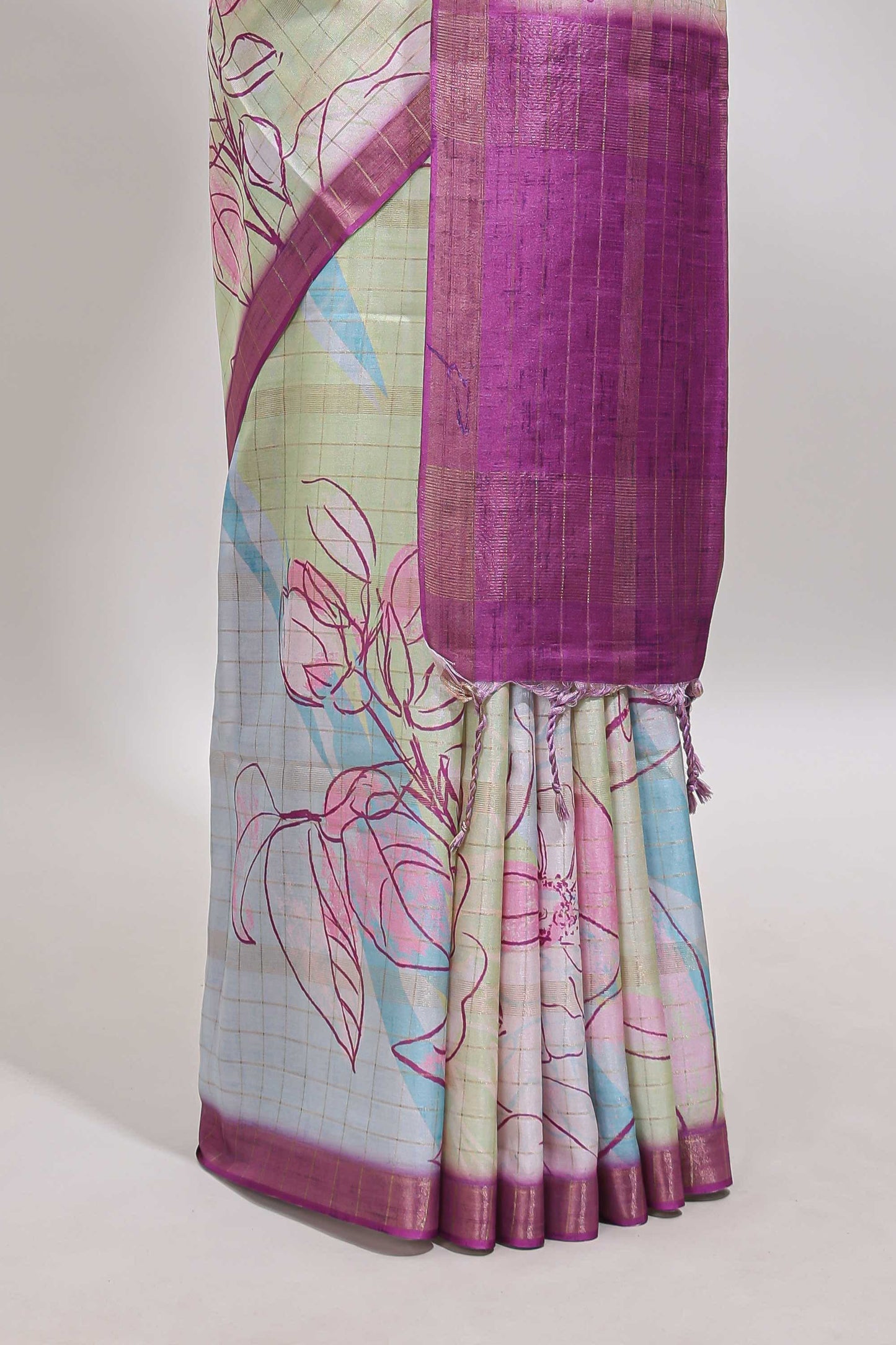 Multi color checked floral design tussar saree with contrast border and zari striped blouse
