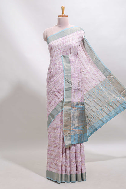 Baby pink geometric design tussar saree with contrast zari border and striped blouse