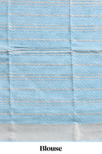 Baby pink geometric design tussar saree with contrast zari border and striped blouse