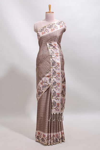 Beaver brown checked tussar saree with contrast ikkat style elephant and floral print border and printed pallu