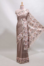 Beaver brown checked tussar saree with contrast ikkat style elephant and floral print border and printed pallu