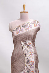 Beaver brown checked tussar saree with contrast ikkat style elephant and floral print border and printed pallu