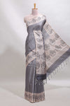 Grey checked tussar saree with contrast traditional elephant border and matching blouse