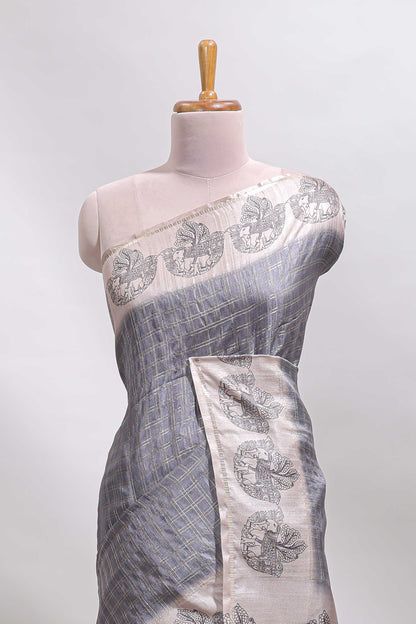 Grey checked tussar saree with contrast traditional elephant border and matching blouse