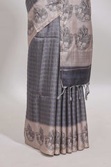 Grey checked tussar saree with contrast traditional elephant border and matching blouse