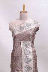 Brown checked tussar saree with contrast traditional elephant border and matching blouse