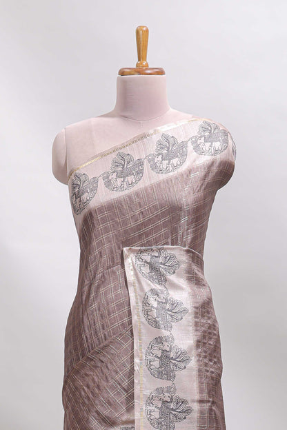 Brown checked tussar saree with contrast traditional elephant border and matching blouse