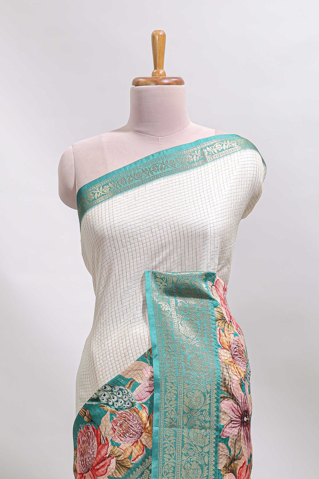 Cream & green dual shade checked peacock & floral design tussar saree with self zari border and matching blouse