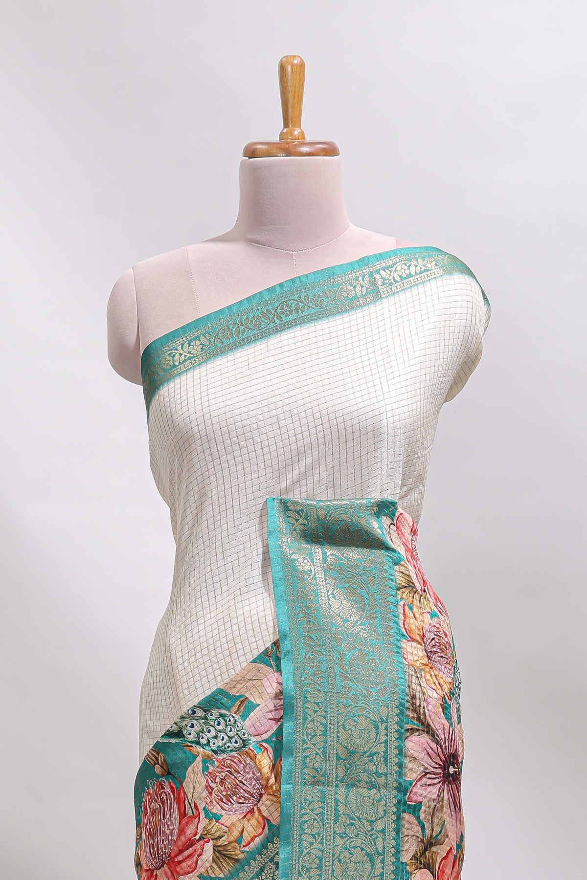 Cream & green dual shade checked peacock & floral design tussar saree with self zari border and matching blouse