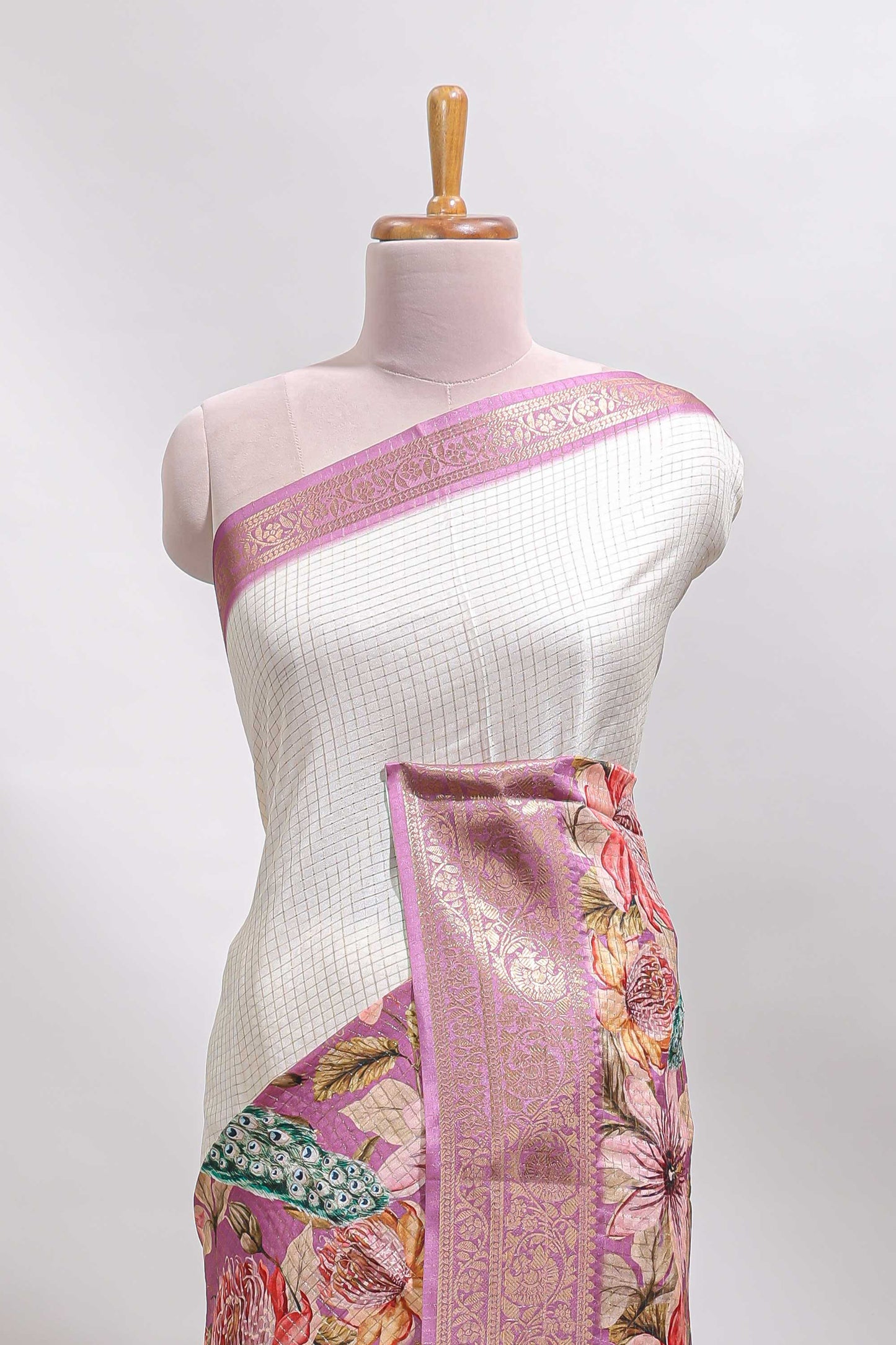 Cream & pink dual shade checked peacock & floral design tussar saree with self zari border and matching blouse