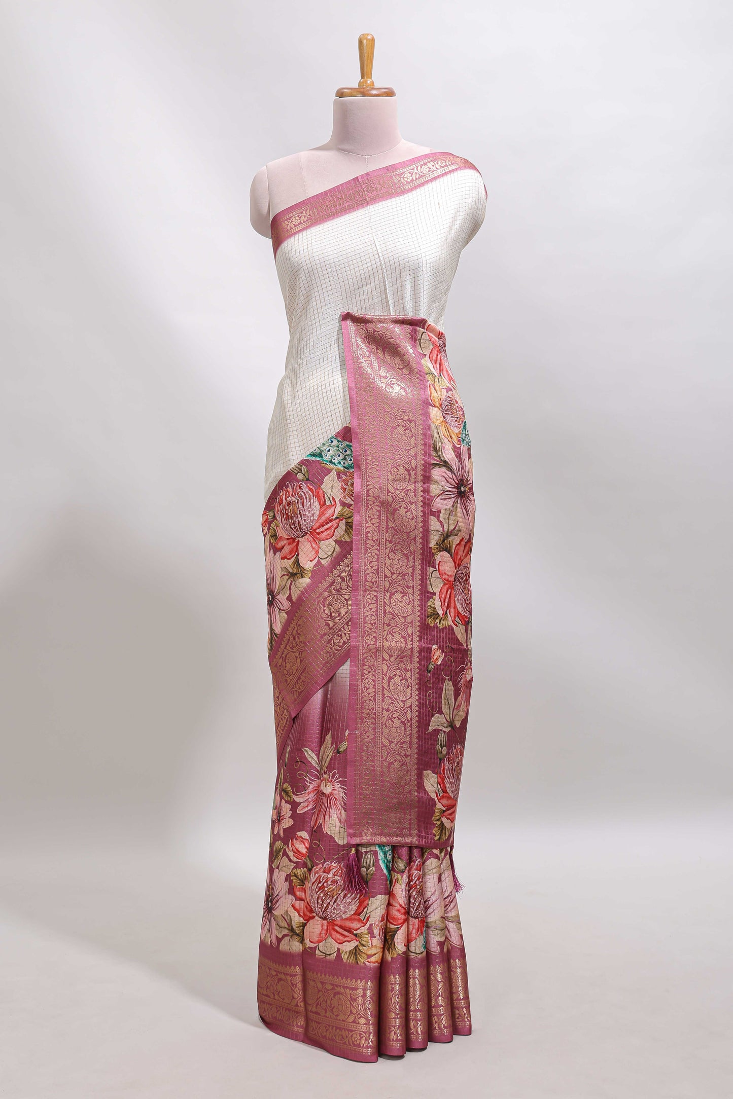 Cream & peach dual shade checked peacock & floral design tussar saree with self zari border and matching blouse