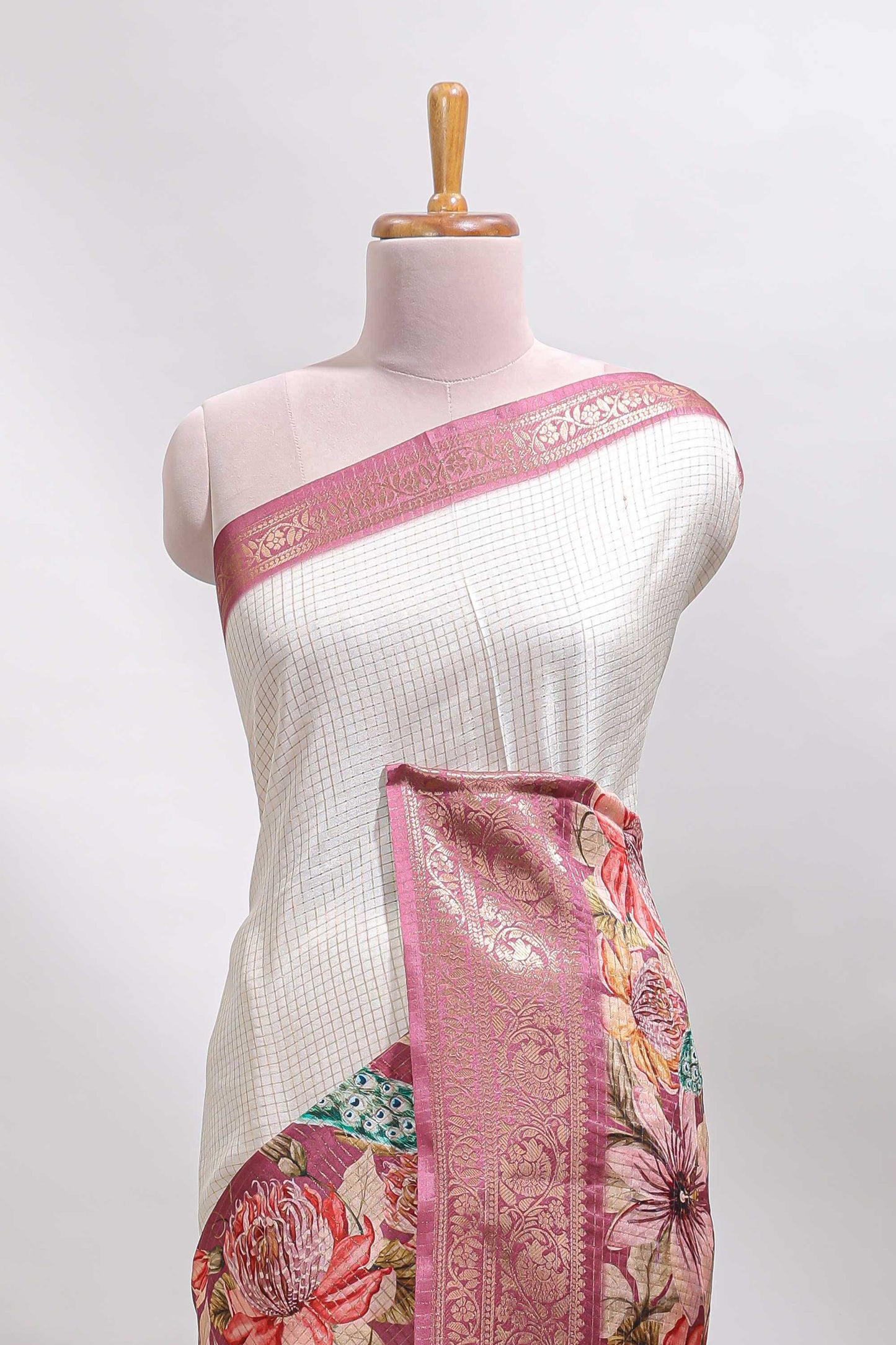 Cream & peach dual shade checked peacock & floral design tussar saree with self zari border and matching blouse