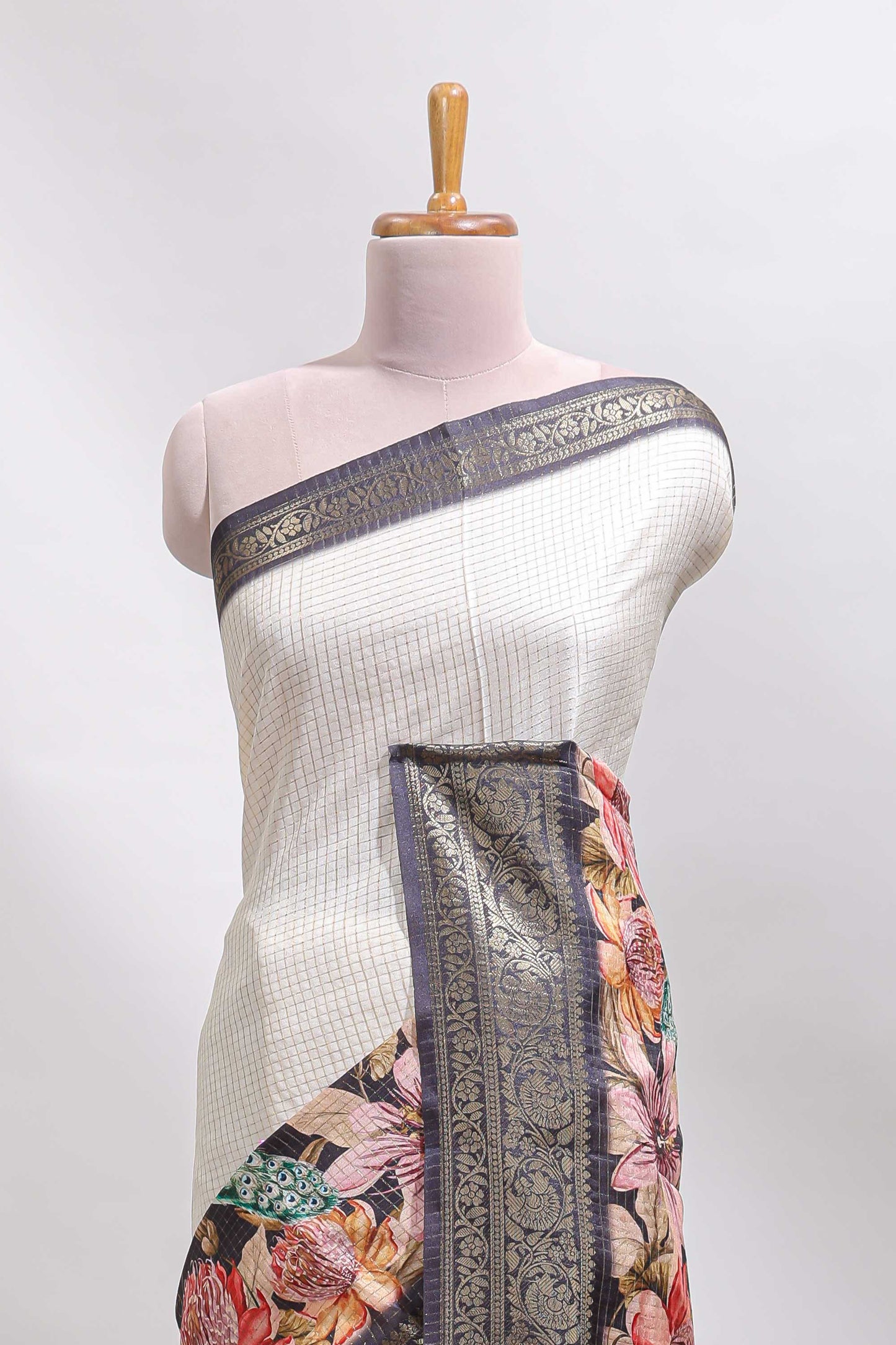 Cream & black dual shade checked peacock & floral design tussar saree with self zari border and matching blouse