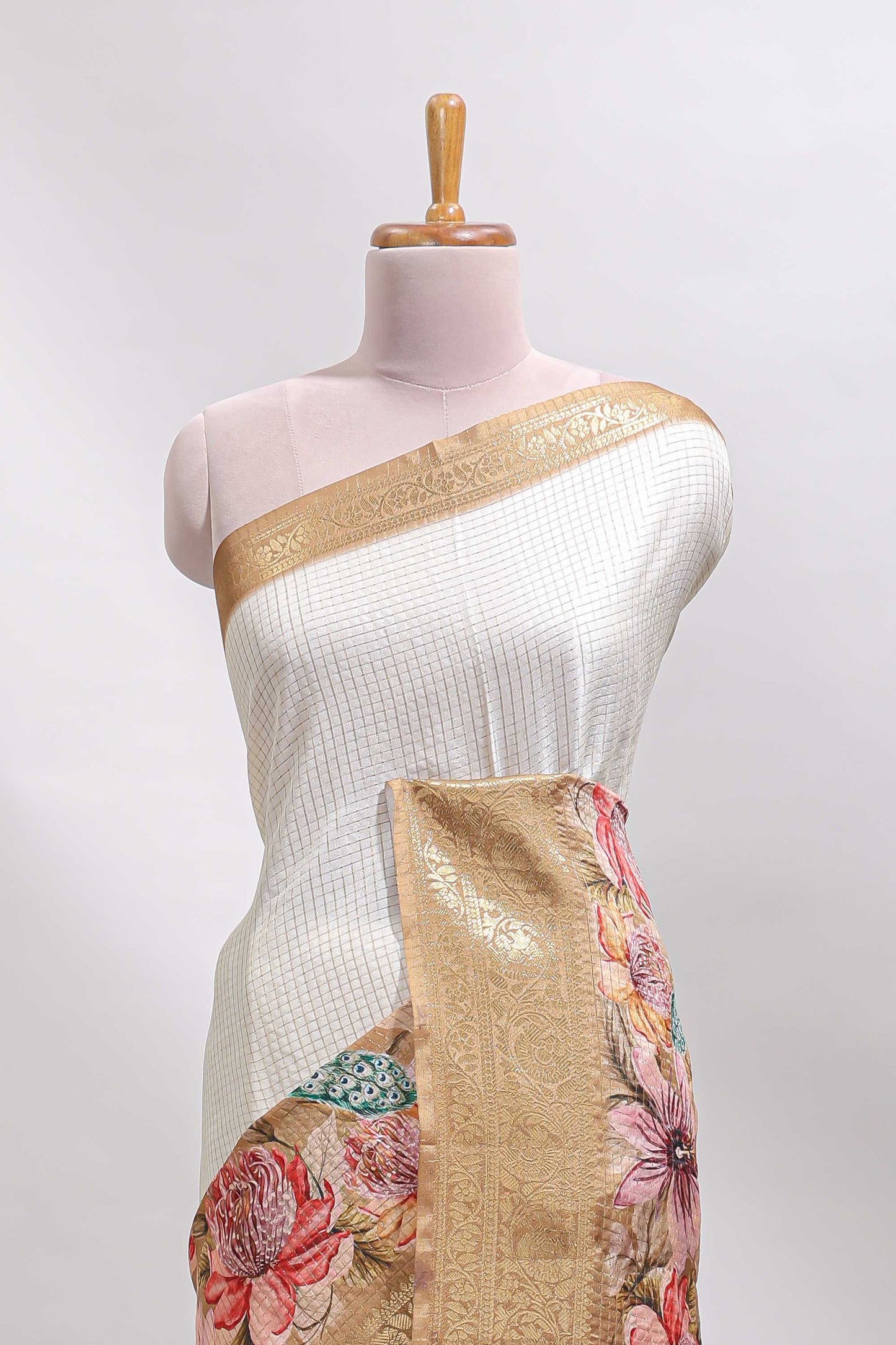 Cream & mustard dual shade checked peacock & floral design tussar saree with self zari border and matching blouse