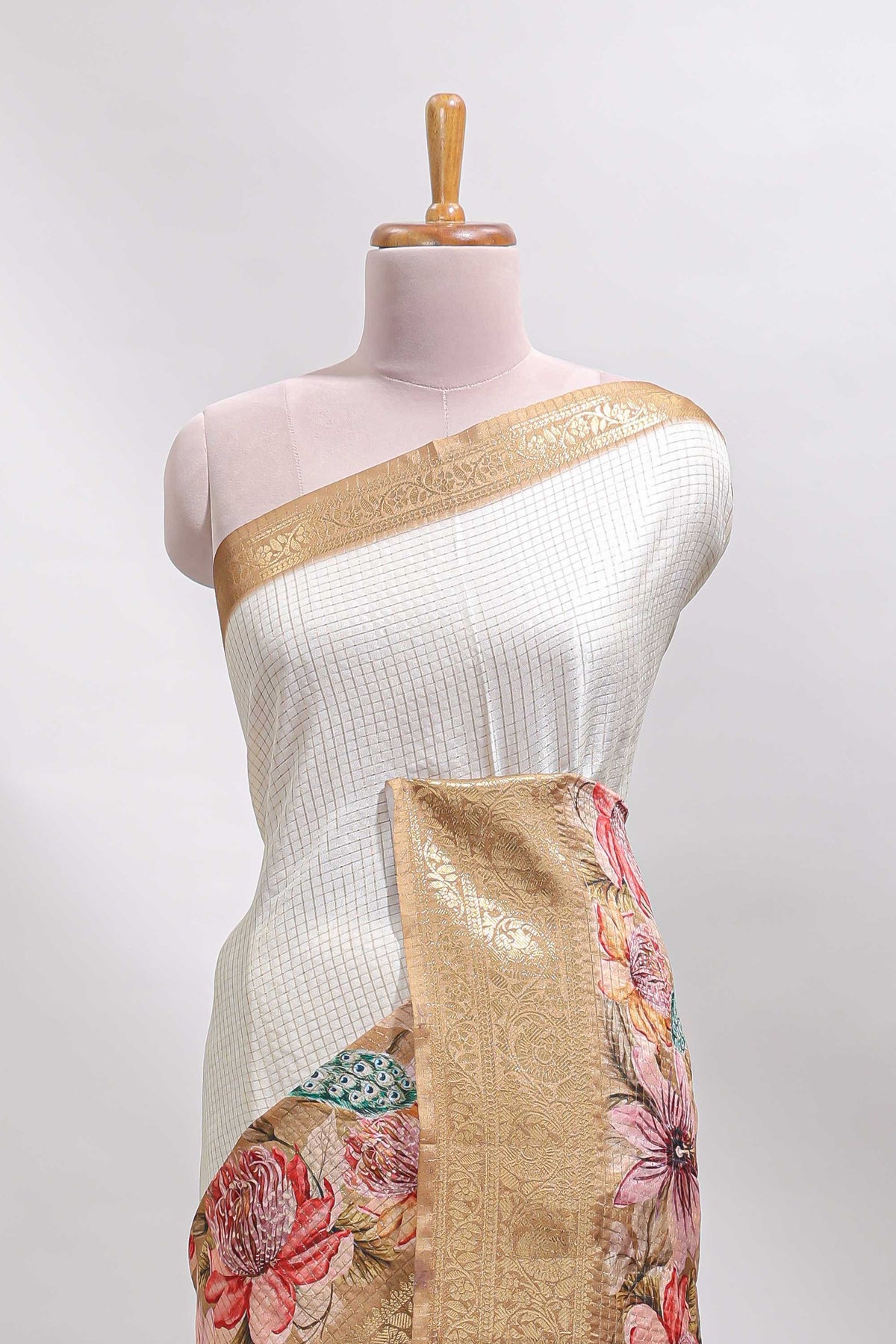 Cream & mustard dual shade checked peacock & floral design tussar saree with self zari border and matching blouse