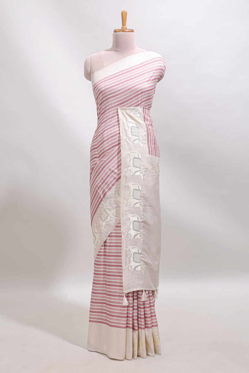 Cream striped tussar saree with contrast border and matching printed blouse