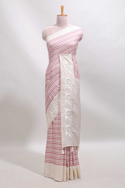 Cream striped tussar saree with contrast border and matching printed blouse