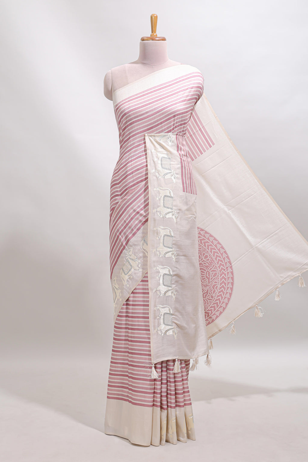 Cream striped tussar saree with contrast border and matching printed blouse