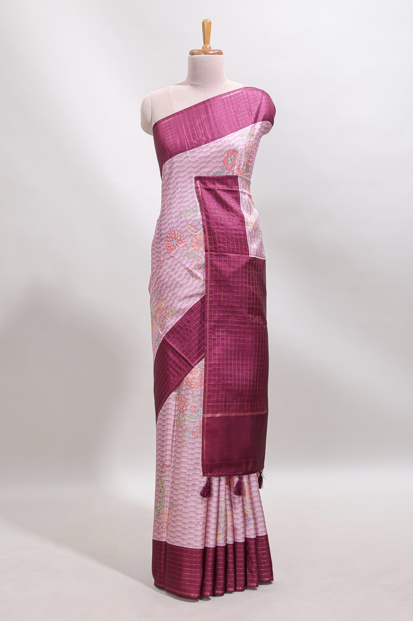 Pink geometric floral design tussar saree with contrast border and floral print blouse
