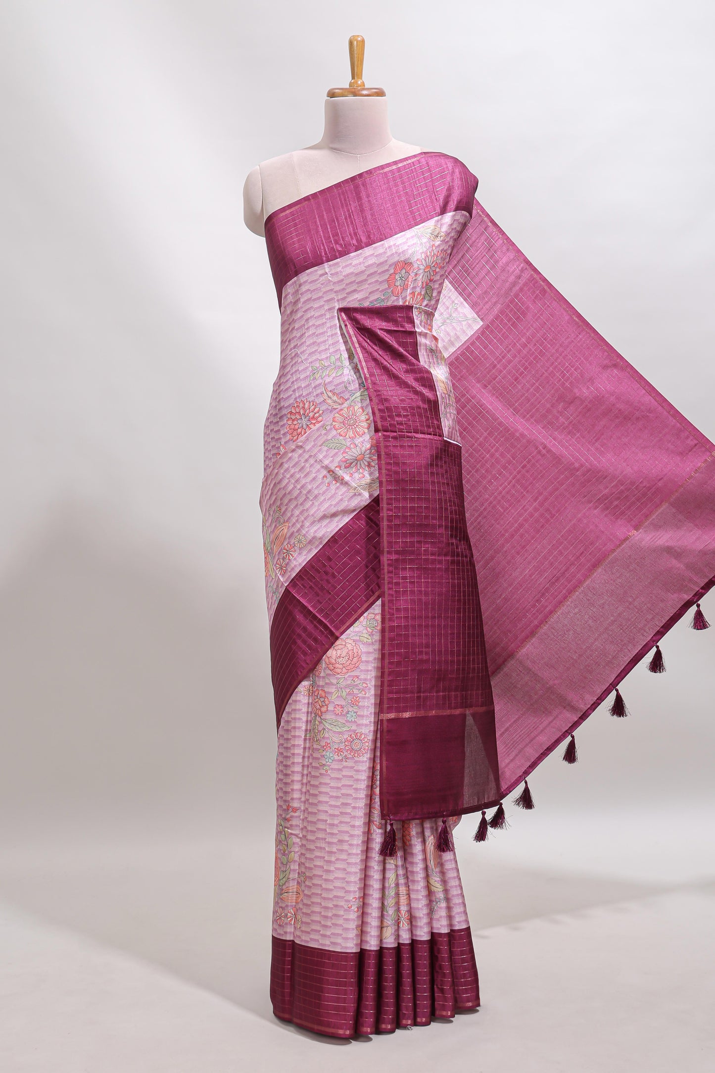 Pink geometric floral design tussar saree with contrast border and floral print blouse