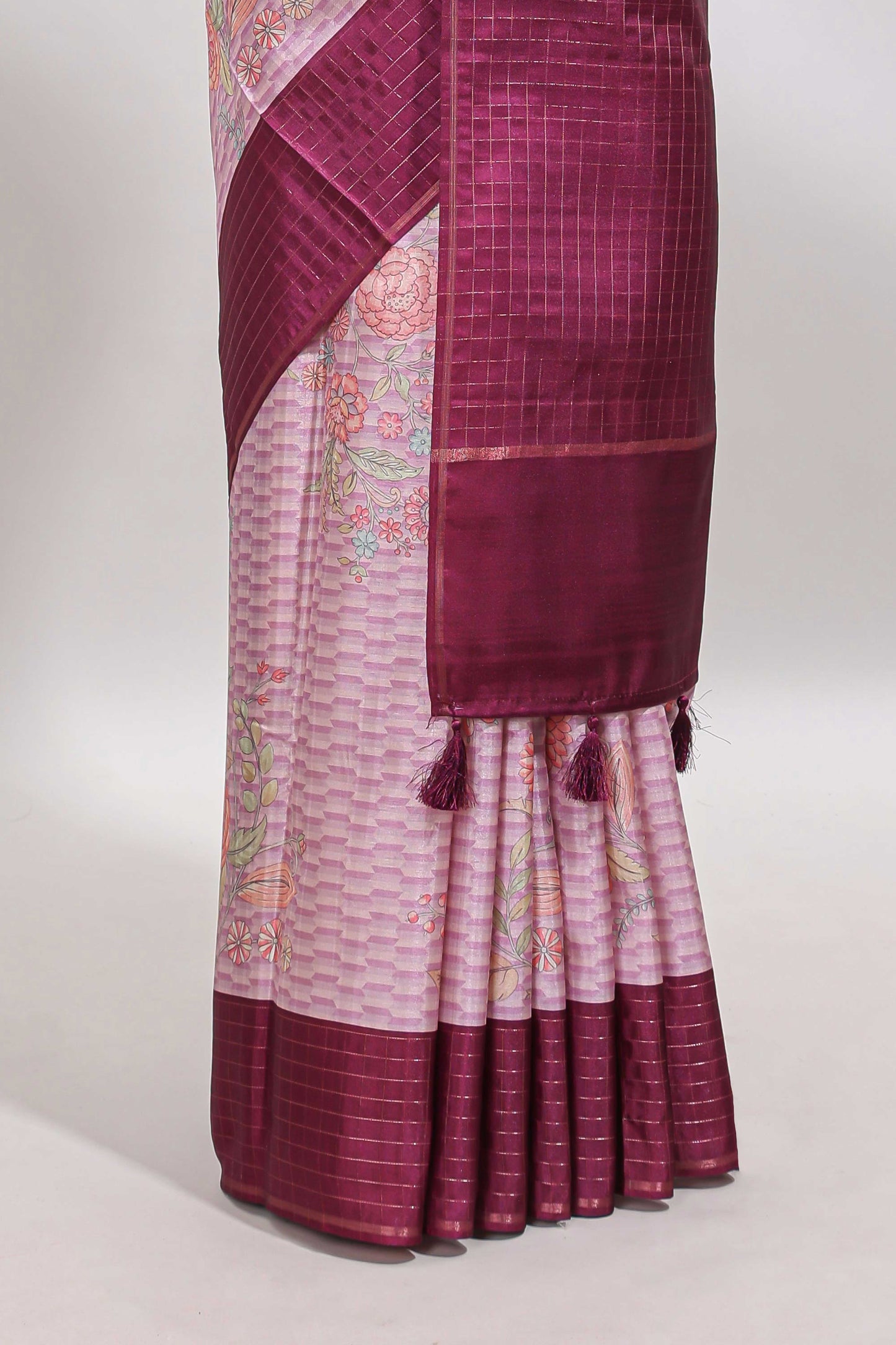 Pink geometric floral design tussar saree with contrast border and floral print blouse