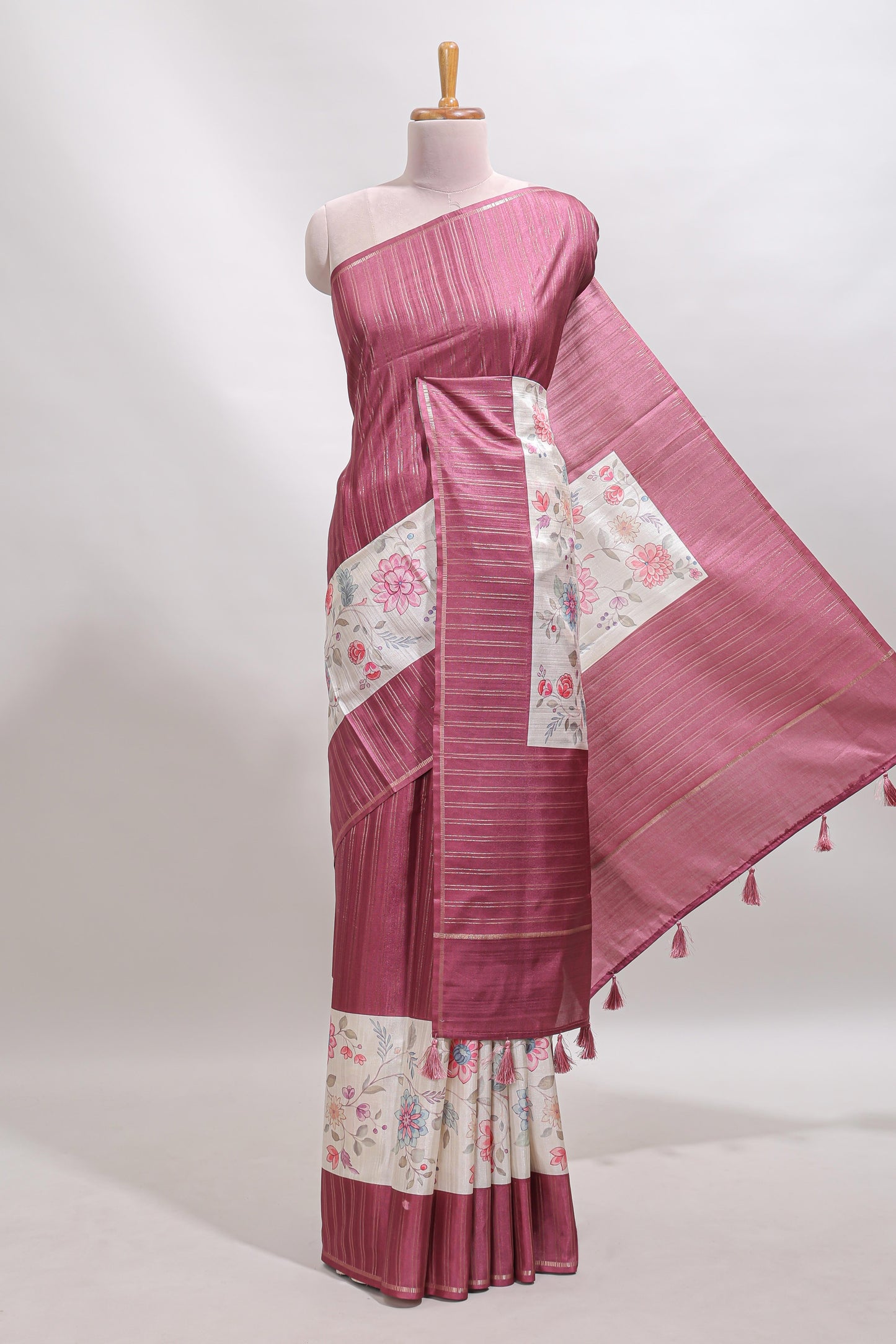 Cream floral design tussar saree with contrast border and floral print blouse