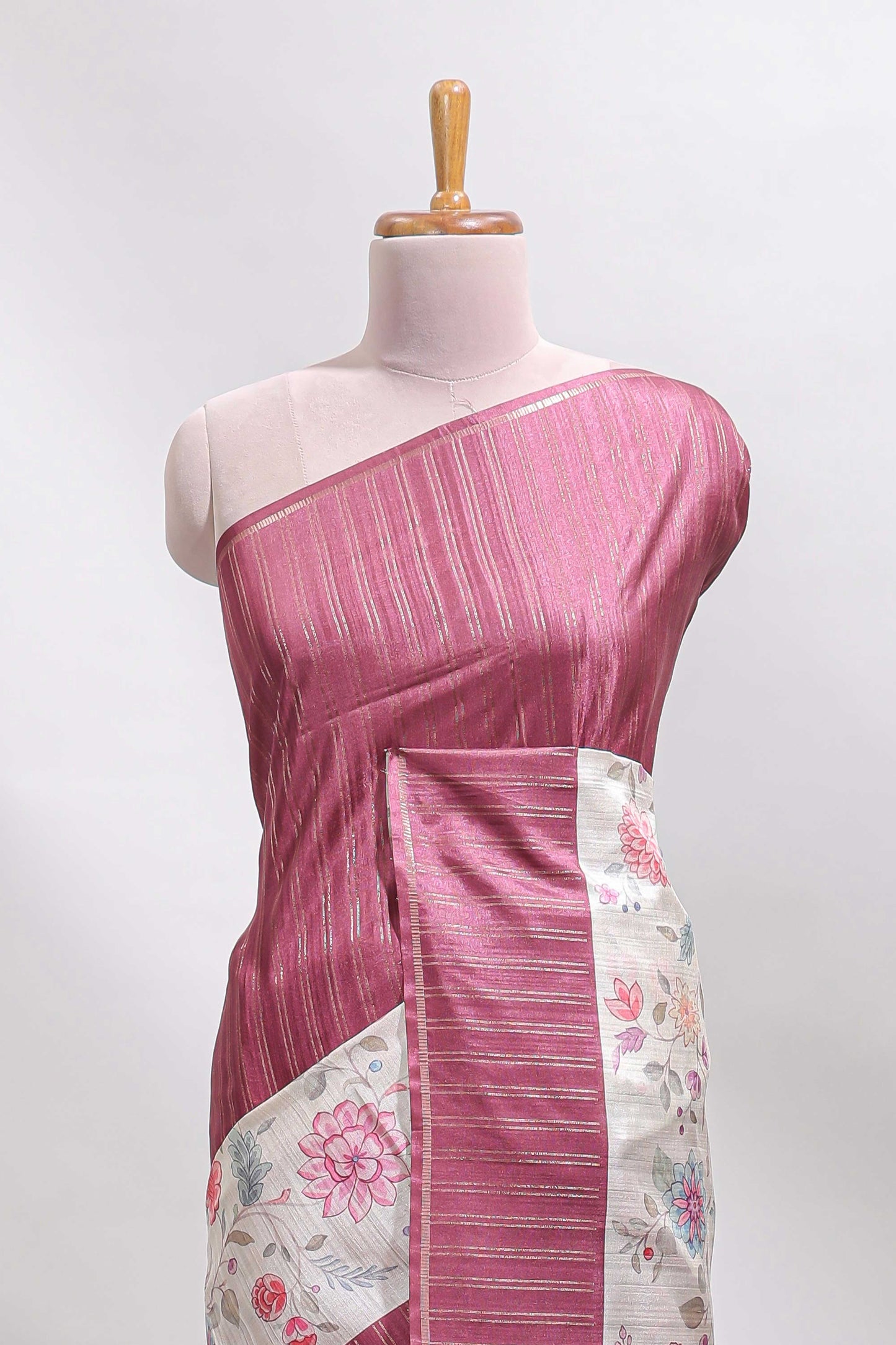 Cream floral design tussar saree with contrast border and floral print blouse