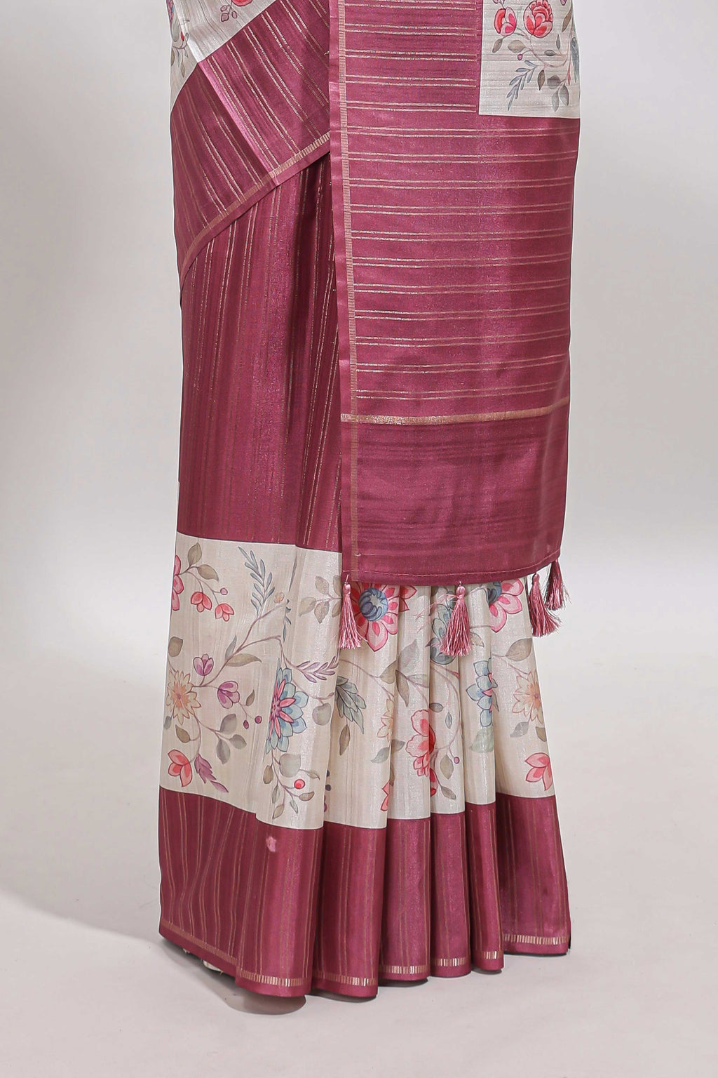 Cream floral design tussar saree with contrast border and floral print blouse