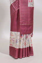 Cream floral design tussar saree with contrast border and floral print blouse