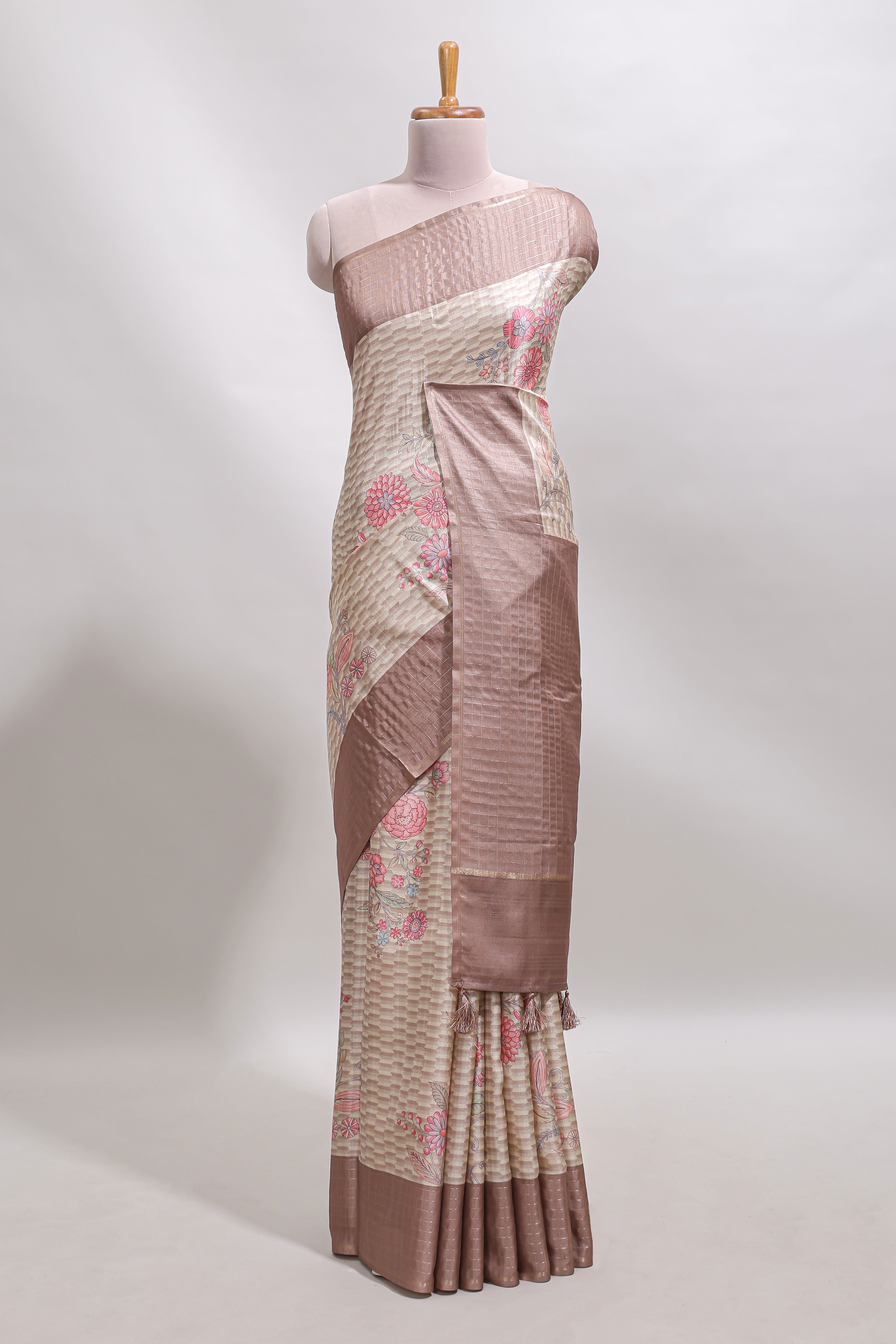 Beige geometric floral design tussar saree with contrast border and floral print blouse