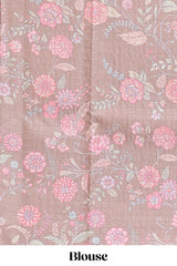 Beige geometric floral design tussar saree with contrast border and floral print blouse