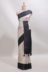 Grey geometric floral design tussar saree with contrast border and floral print blouse