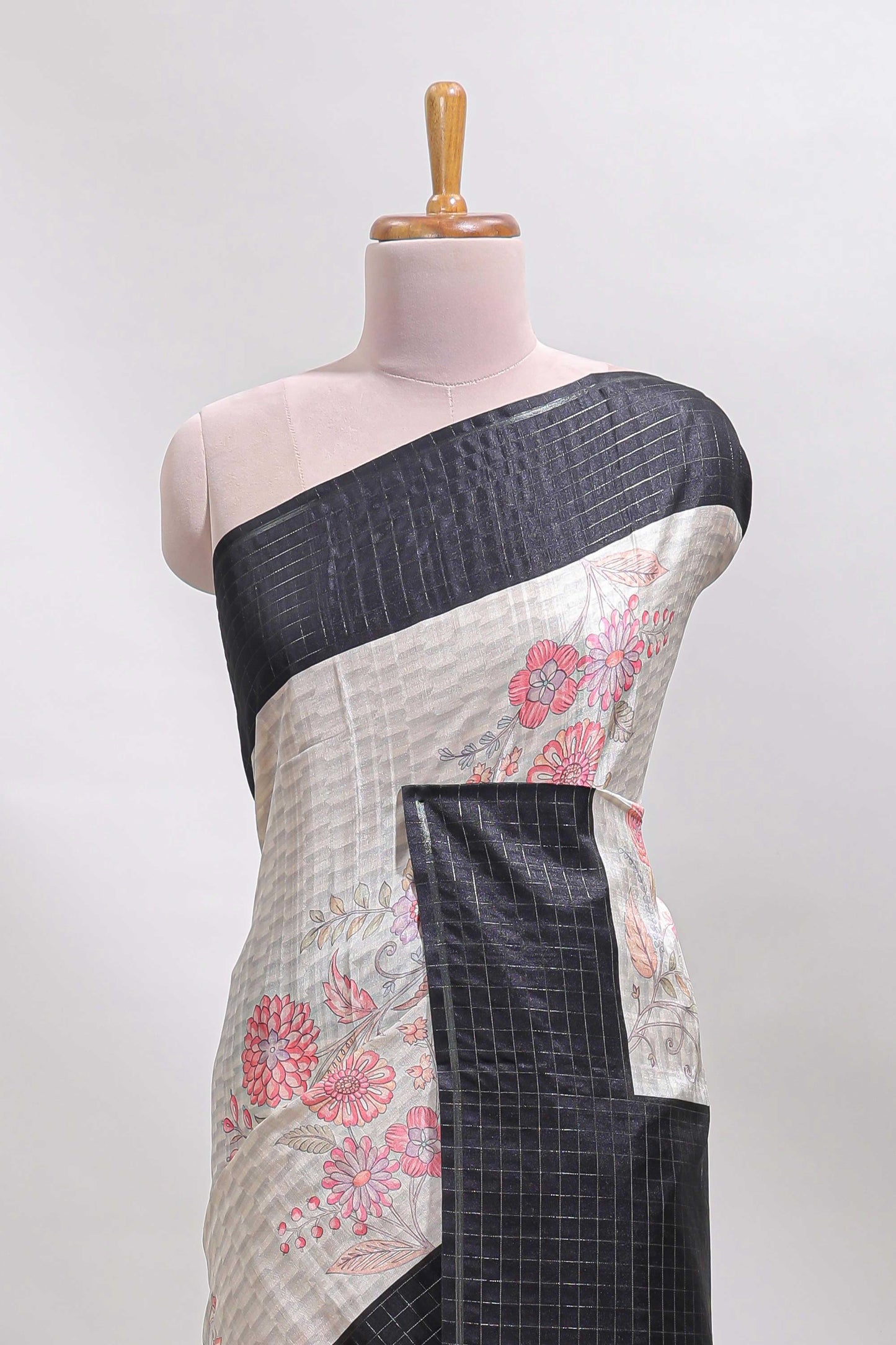 Grey geometric floral design tussar saree with contrast border and floral print blouse