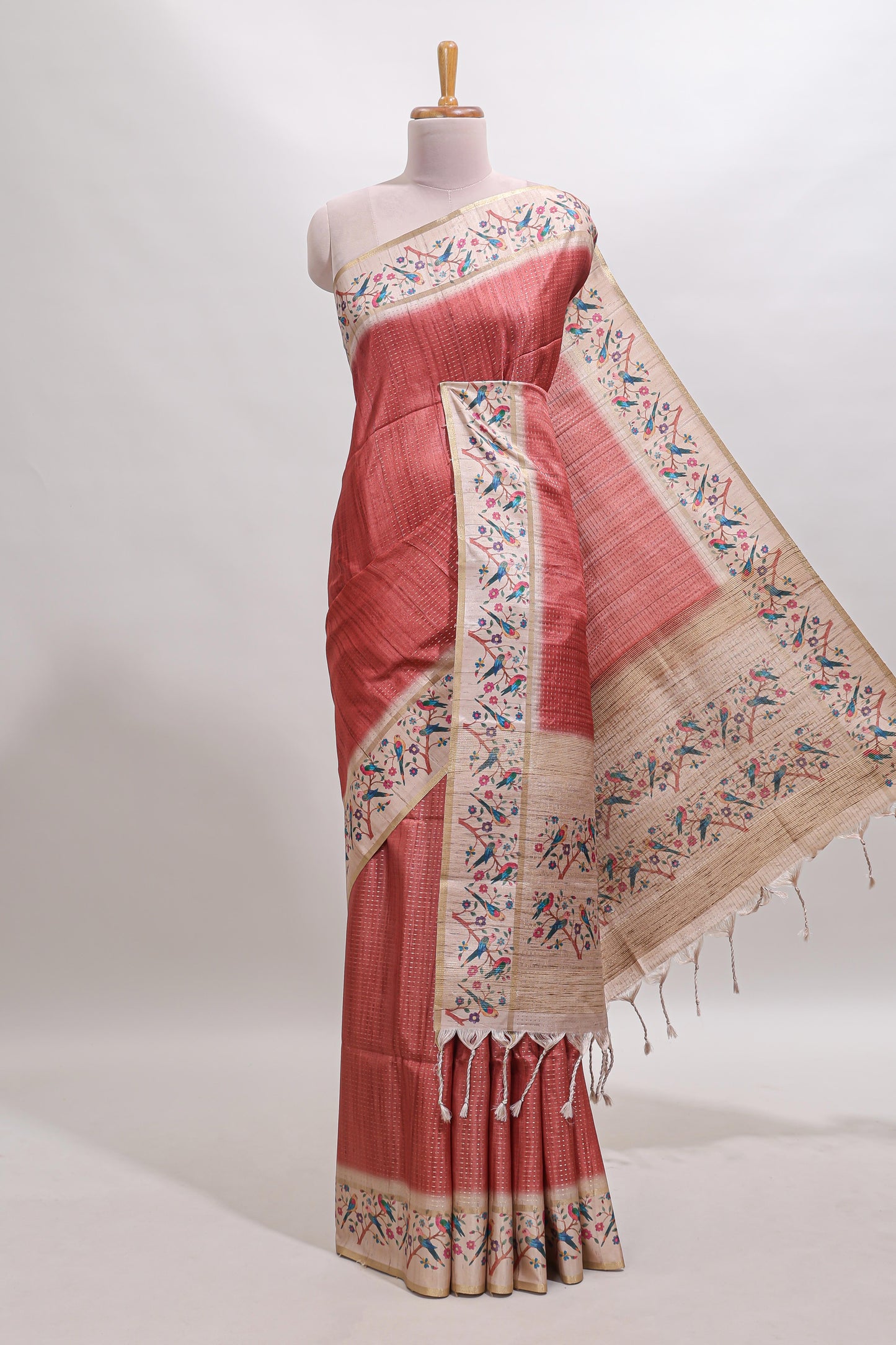 Peach striped tussar saree with contrast birds & floral design border and floral printed blouse