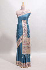 Blue striped tussar saree with contrast birds & floral design border and floral printed blouse