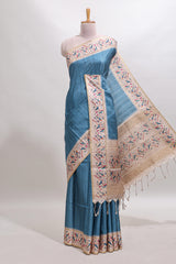 Blue striped tussar saree with contrast birds & floral design border and floral printed blouse