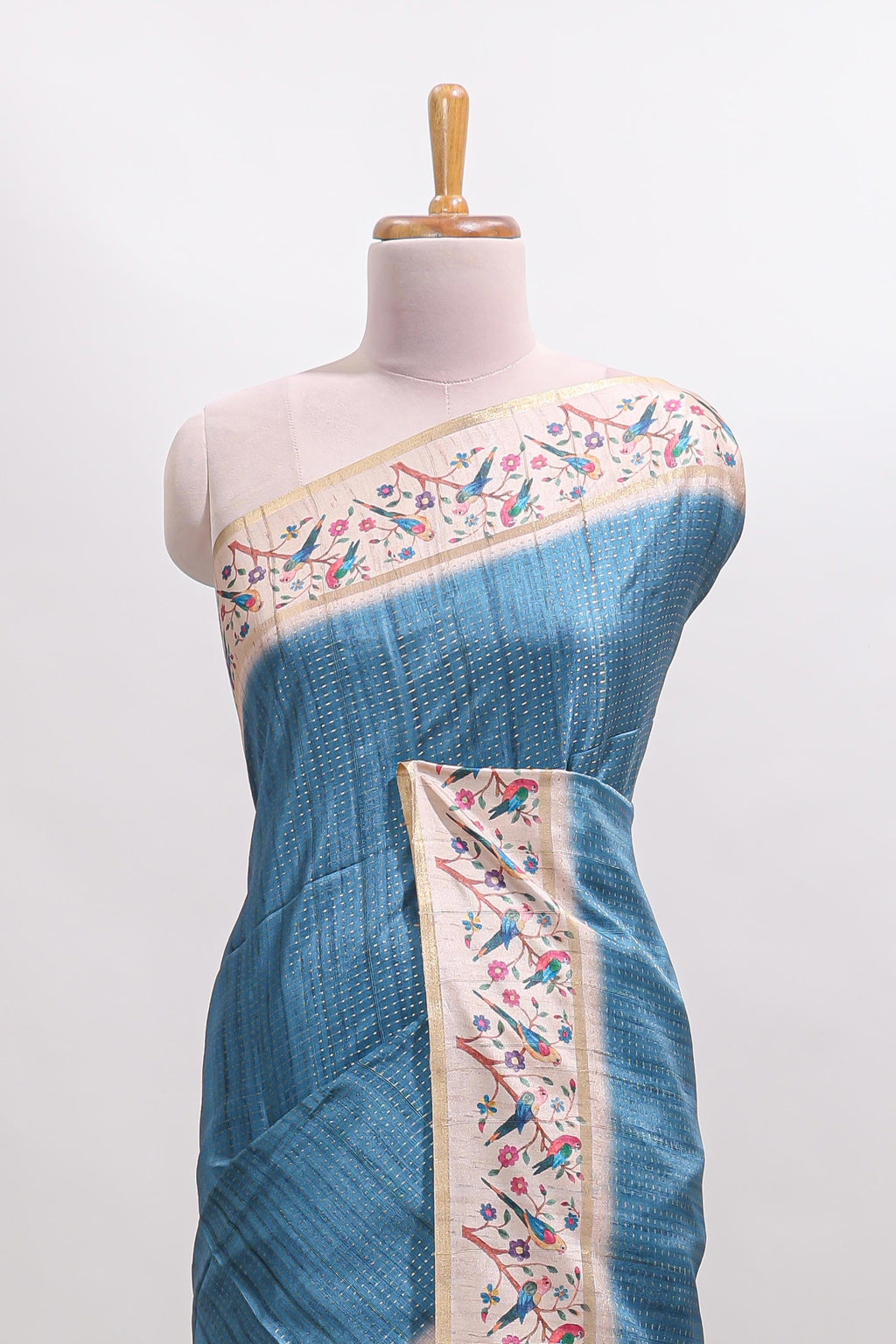 Blue striped tussar saree with contrast birds & floral design border and floral printed blouse