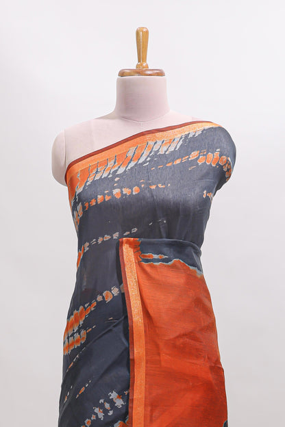 Grey shibori design tussar saree with contrast zari border and blouse