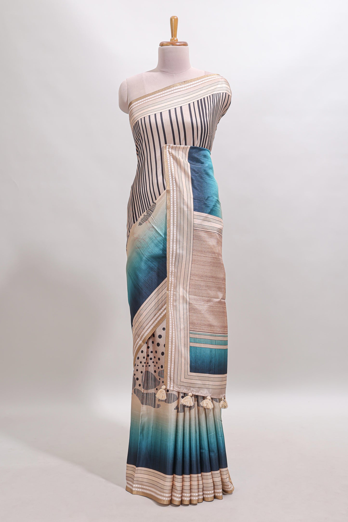 Beige geometric design tussar saree with self border and matching blouse