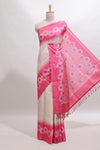 Beige striped floral motifs tussar saree with contrast floral print border and printed pallu