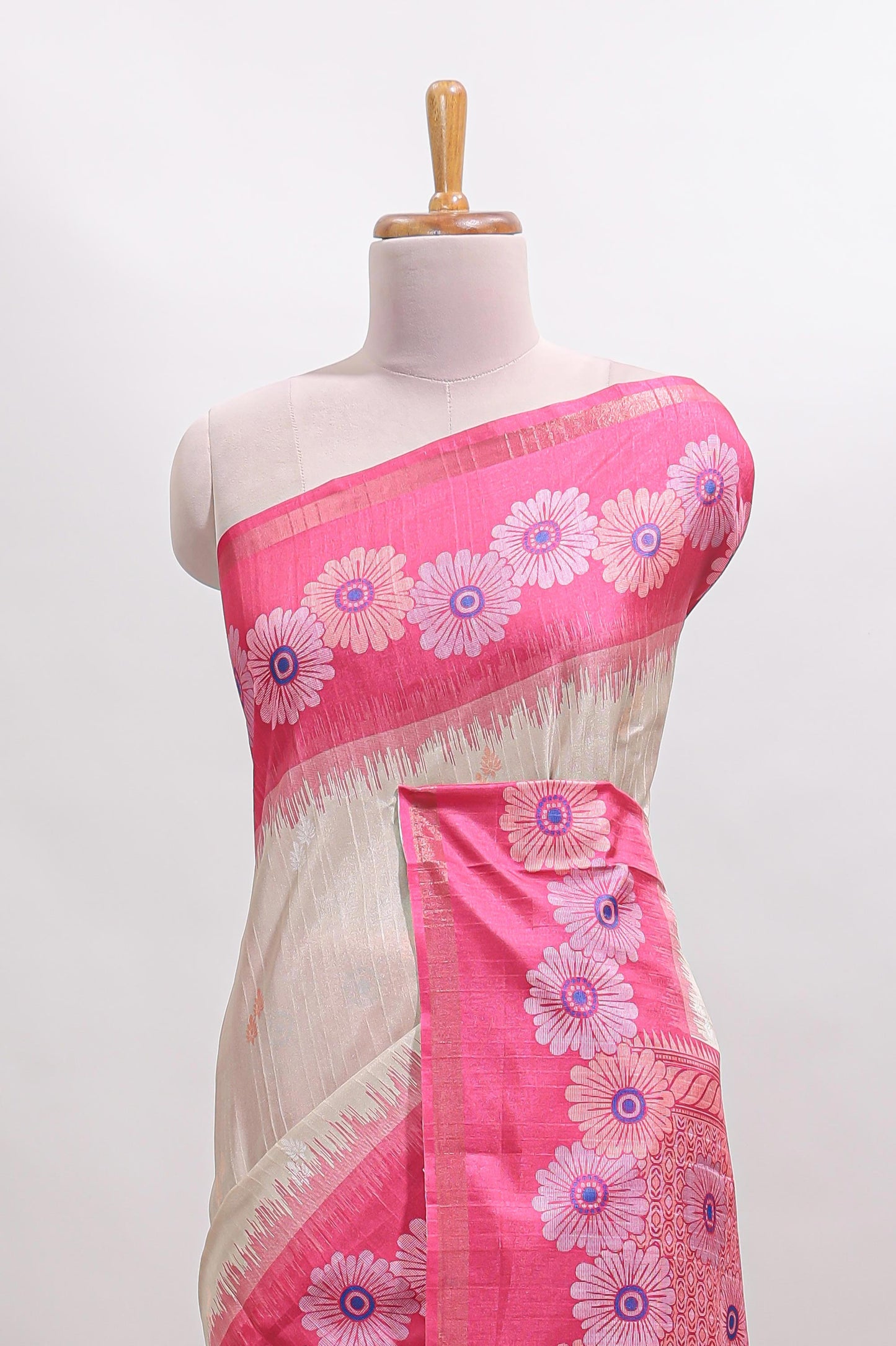 Beige striped floral motifs tussar saree with contrast floral print border and printed pallu