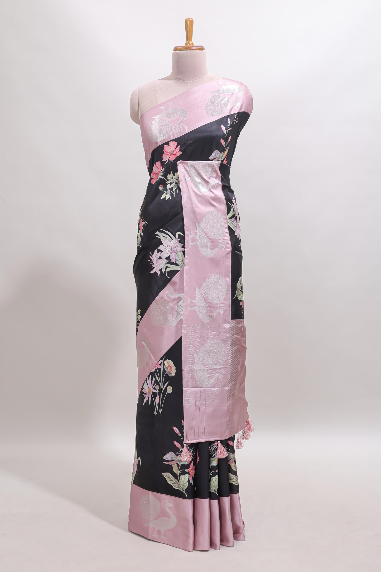 Black floral design tussar saree with contrast peacock design zari border and blouse