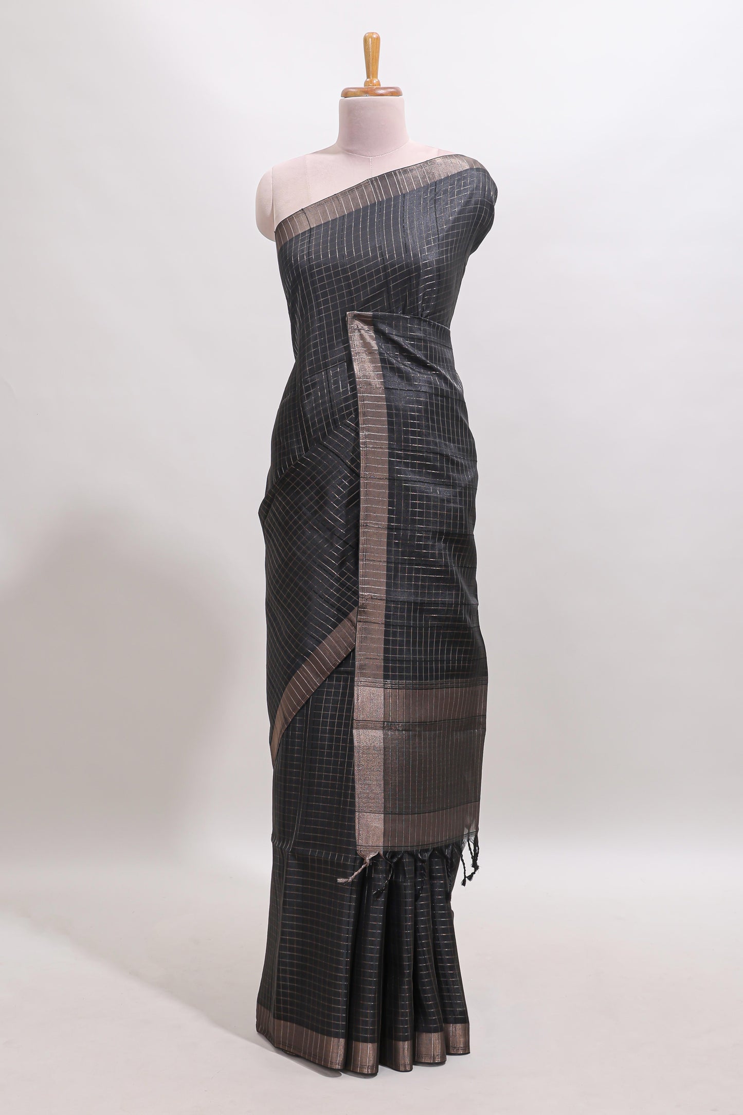 Black checked tussar saree with self zari border and matching striped blouse