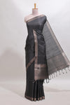 Black checked tussar saree with self zari border and matching striped blouse