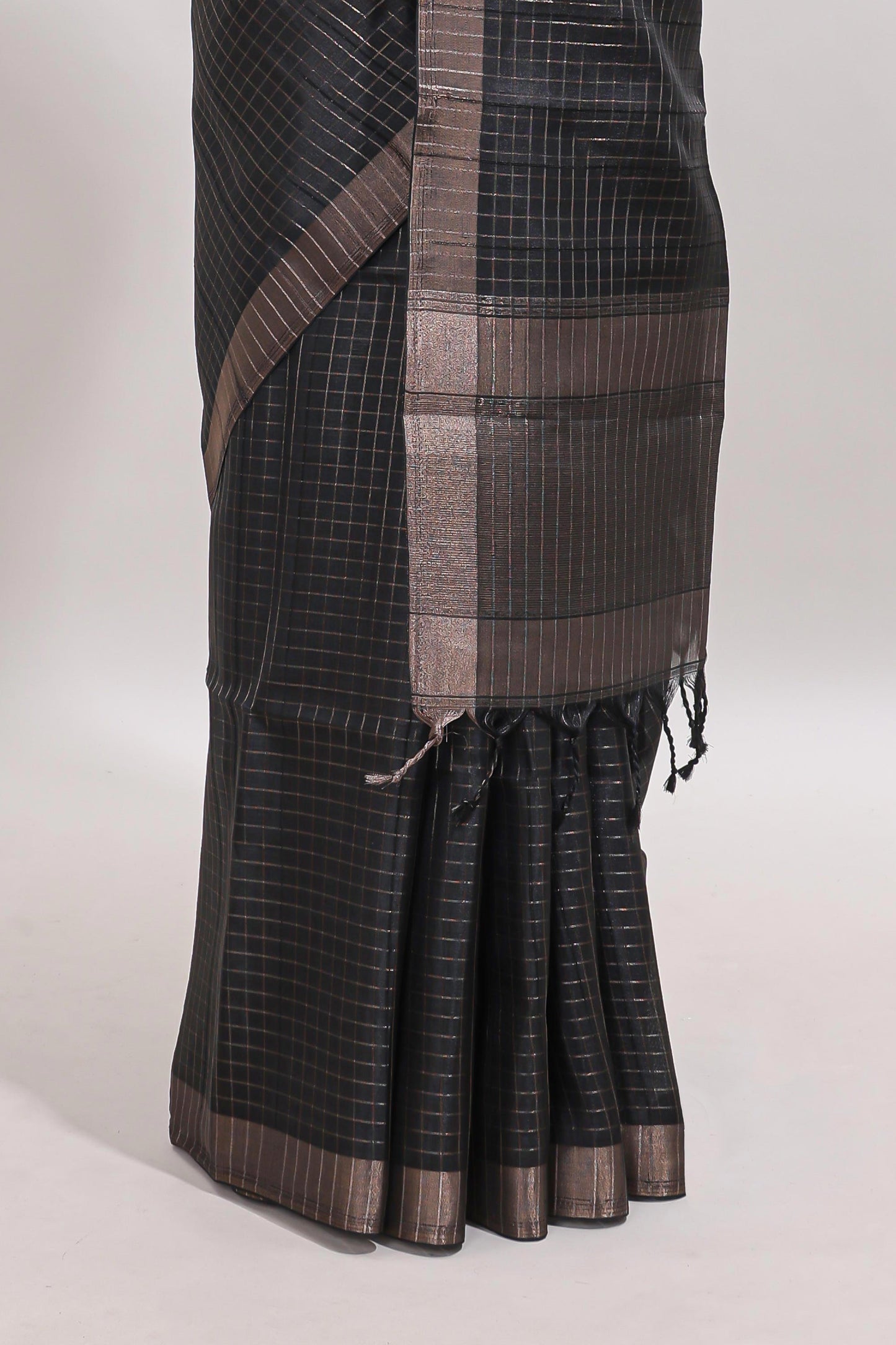 Black checked tussar saree with self zari border and matching striped blouse