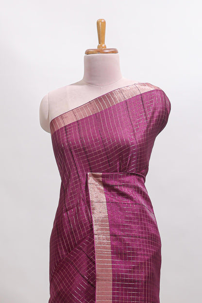 Magenta checked tussar saree with self zari border and matching striped blouse