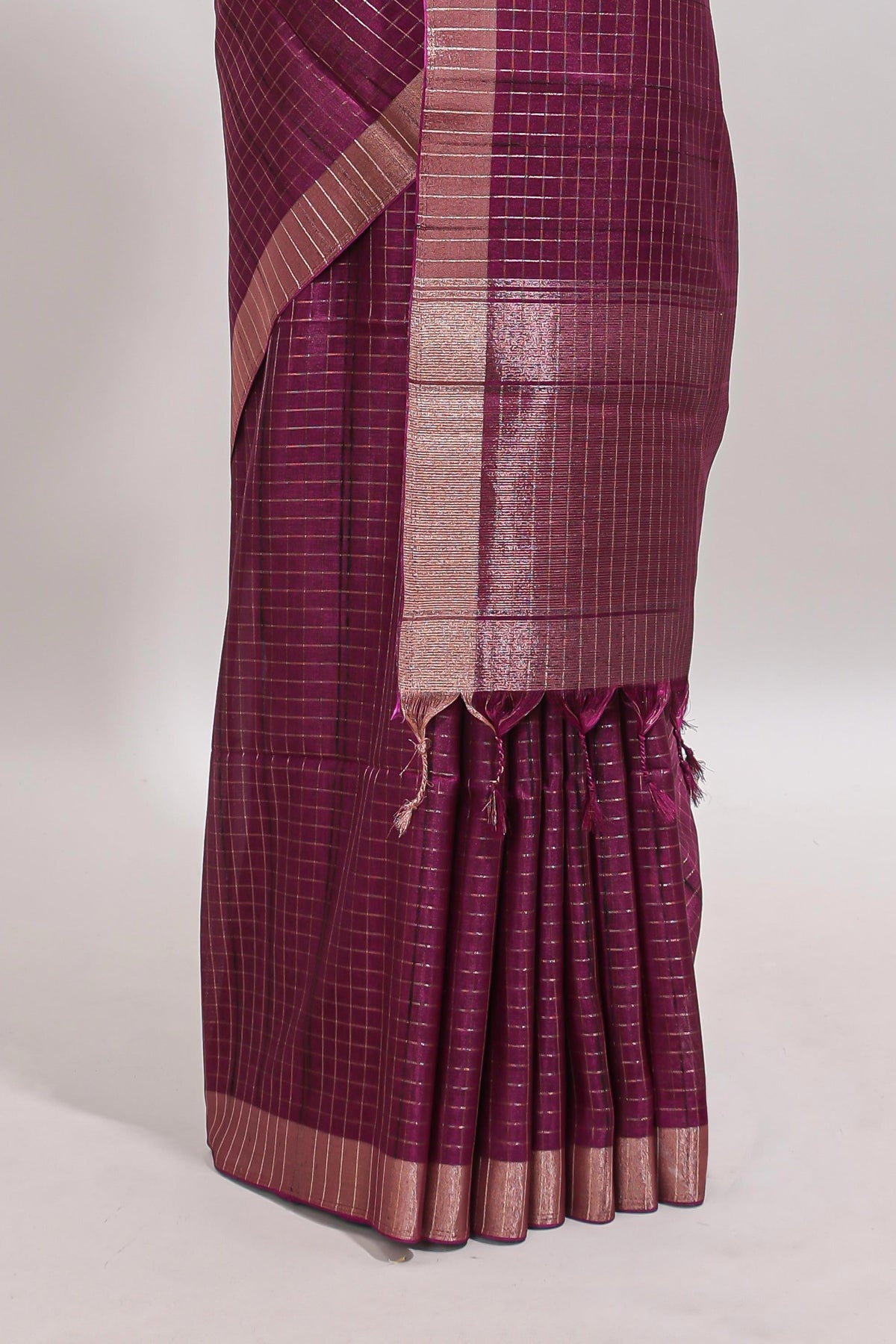 Magenta checked tussar saree with self zari border and matching striped blouse