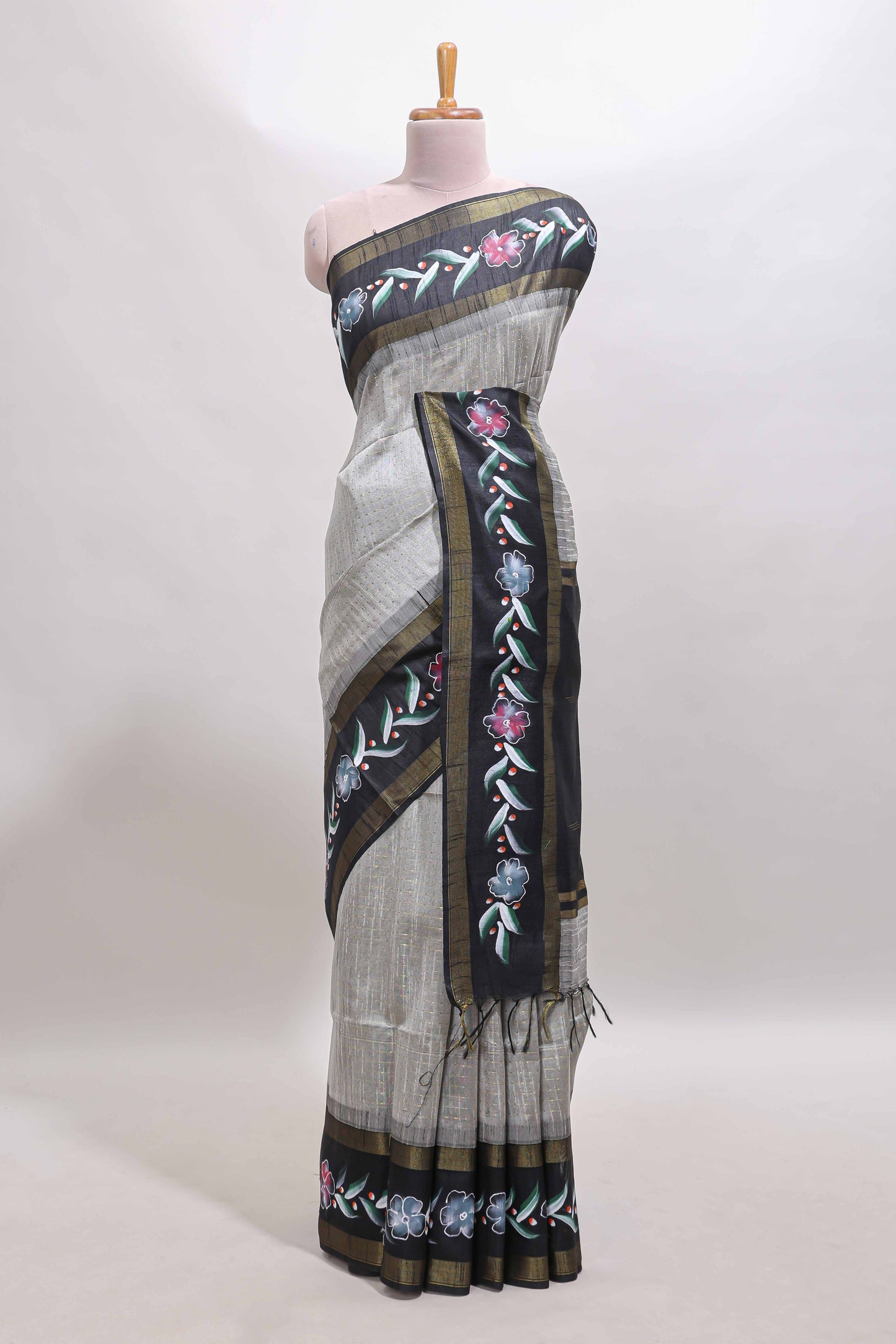 Grey zari design tussar saree with contrast floral print border and blouse