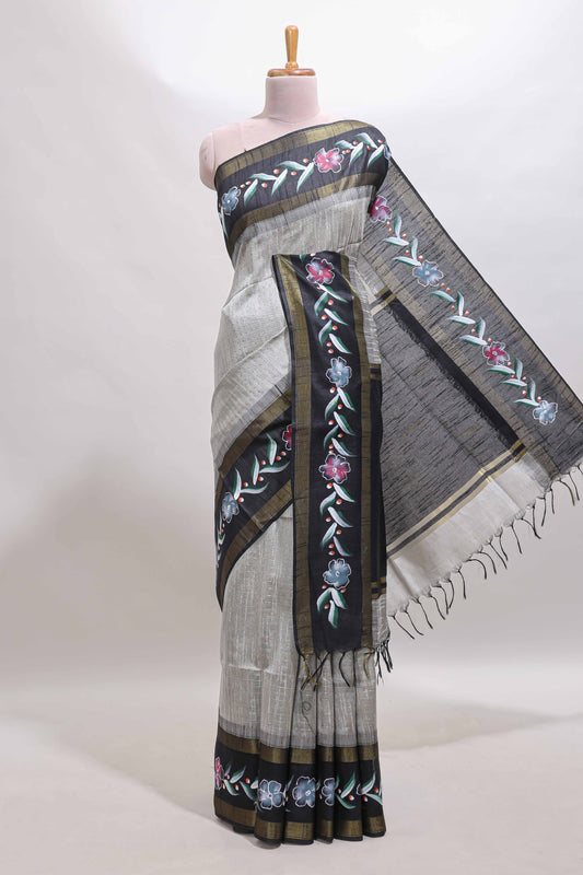 Grey zari design tussar saree with contrast floral print border and blouse